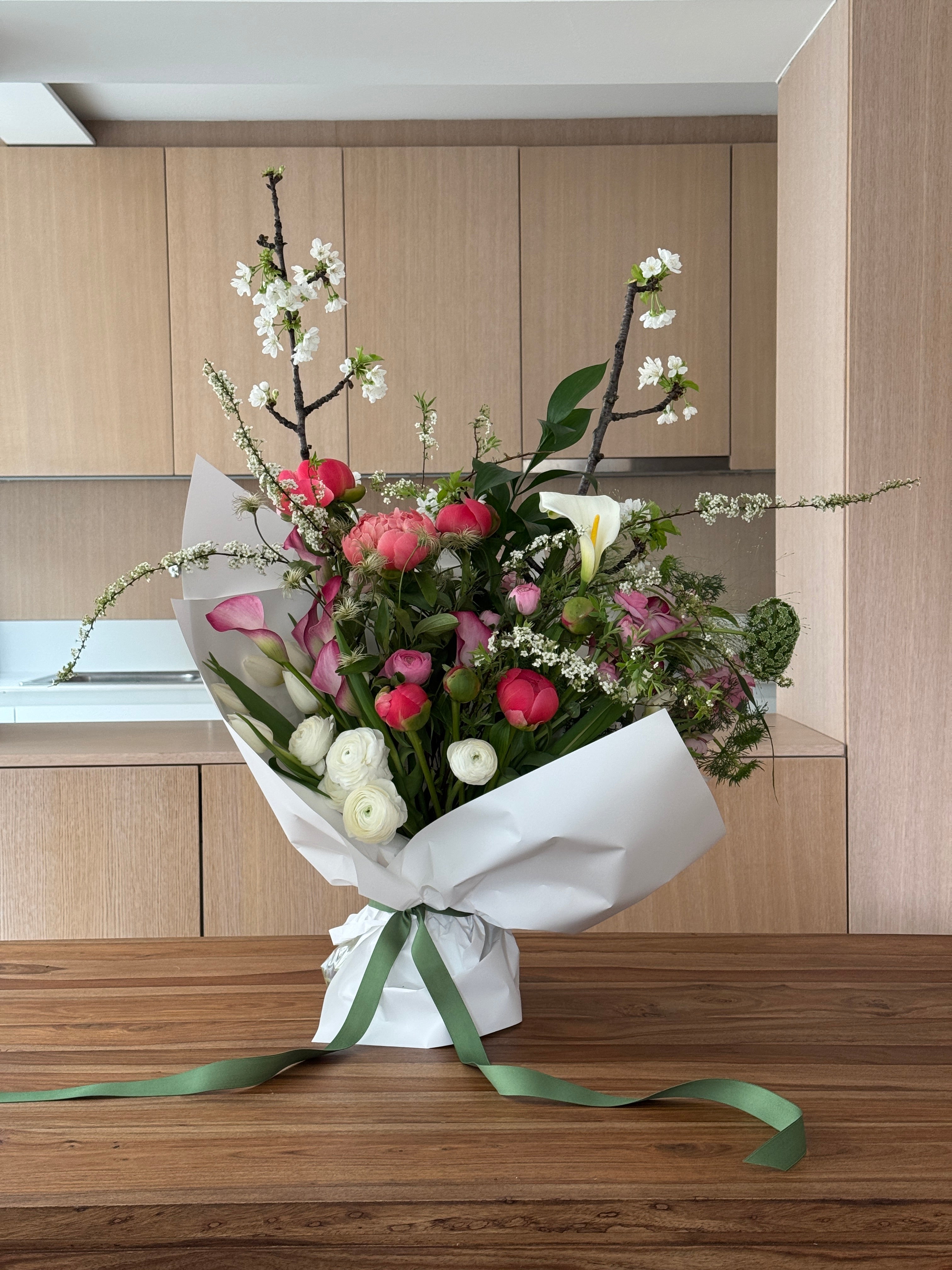 Bouquet of Peony Coral Charm, Ranunculus Butterfly and Blooming Branches - Luxury from Meadow, available in Barcelona